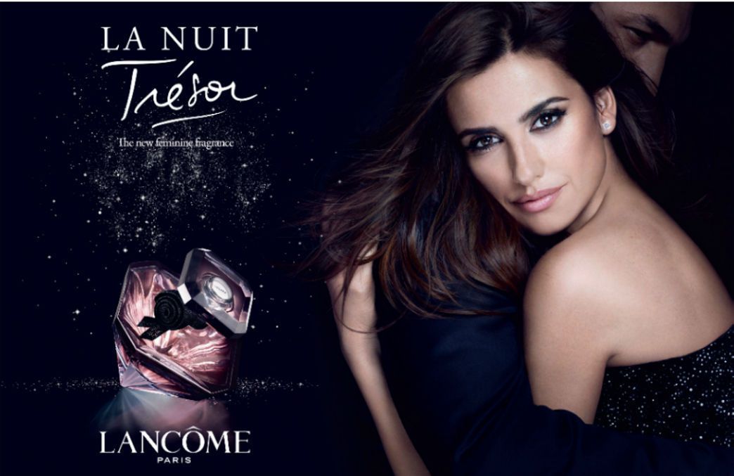 Lancome La Nuit Tresor L'eau de Parfume 1.2 ml  น้ำหอมกลิ่นเซ็กซี่โรแมนติค เย้ายวนน่าค้นหา เปล่งประกายความเจิดจรัส ด้วยการผสานกลิ่นหอมของดอก Passion และ Jasmine ด้วยการขจรขจายและคงความหอมอันน่าทึ่ง   การโคจรมาพบกันอย่างที่ไม่เคยมีมาก่อนนี้ได้มอบภาพลักษณ์แห่งความเย้ายวน ความลึกลับชวนค้นหา และความน่าลุ่มหลงให้กับ La Nuit Trésor อย่างหลีกเลี่ยงมิได้  ขวดน้ำหอมลังโคมสีม่วง เป็นรูปทรงแพชรสุดหรู 